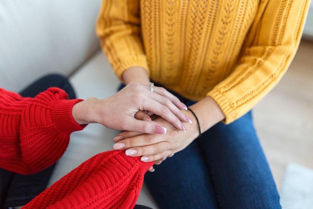 a-pair-of-hands-being-held-by-a-doctor-hands