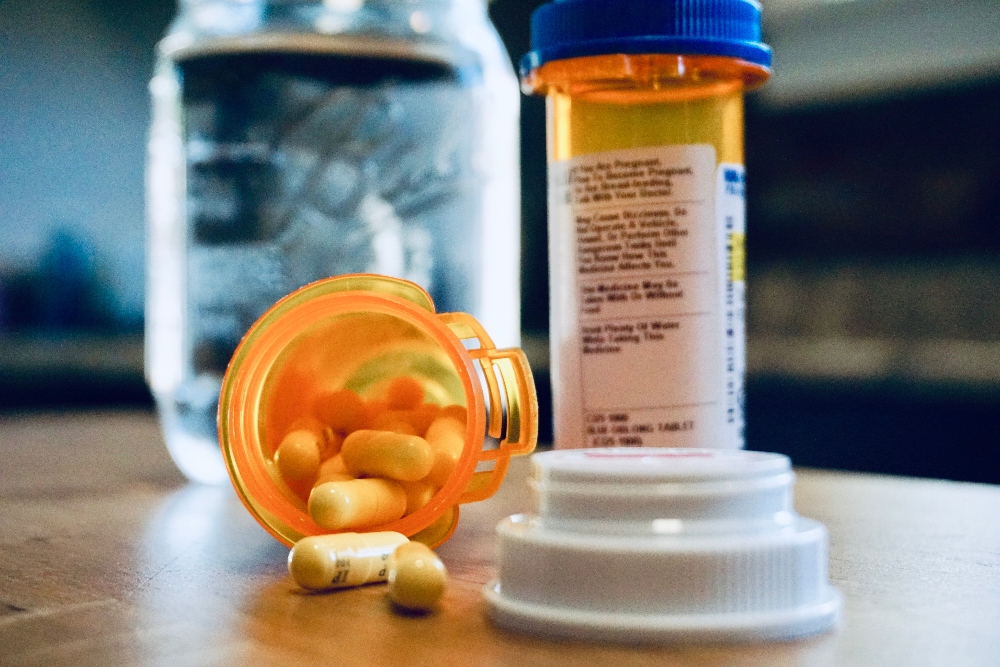 prescription medicine bottle spilled on counter
