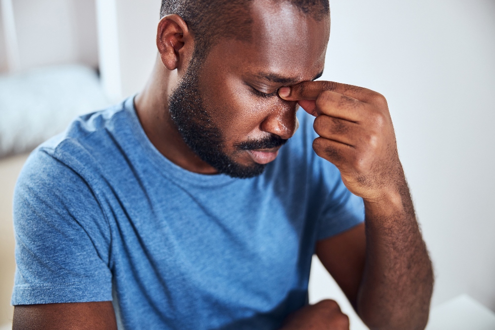 man dealing with chronic pain and addiction